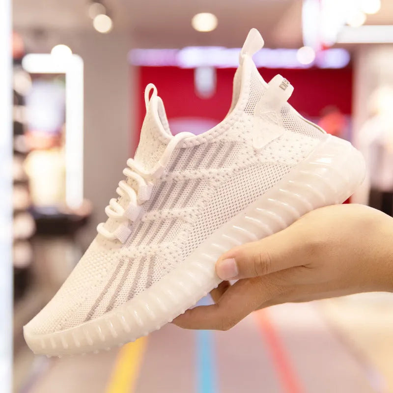 Men's white breathable sports shoes with platform heel and mesh lining on a white background