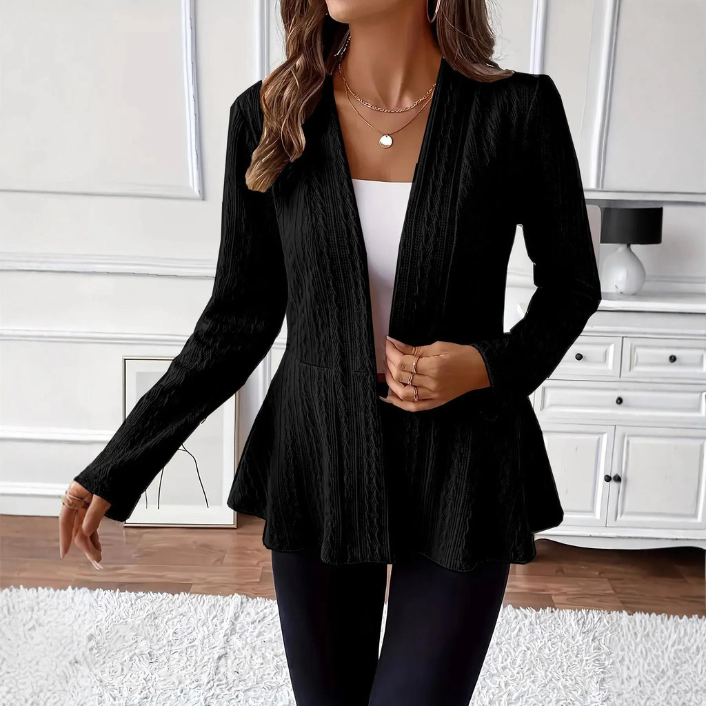 Women's apricot jacquard knit cardigan with one button, shown on a model.