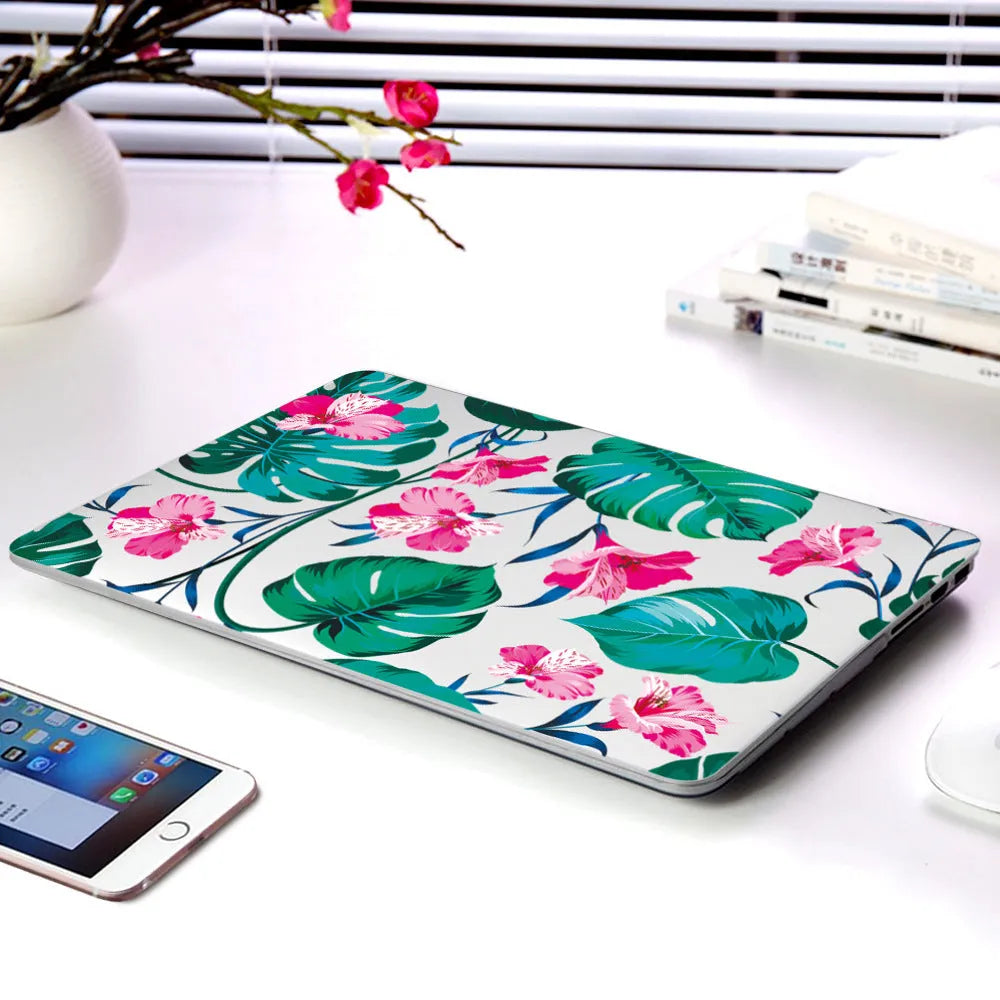 Plastic laptop protective shell with floral pattern for Apple MacBook Air and Pro models.