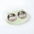 Blue macaron-shaped plastic pet feeder tray with two bowls for food and water.