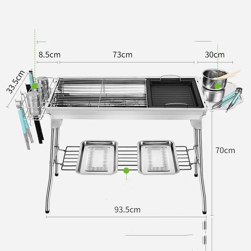 Large stainless steel folding barbecue grill set up for outdoor cooking.