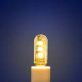 Small white USB-powered LED baby night light with eye protection, shown next to a USB cable for scale.