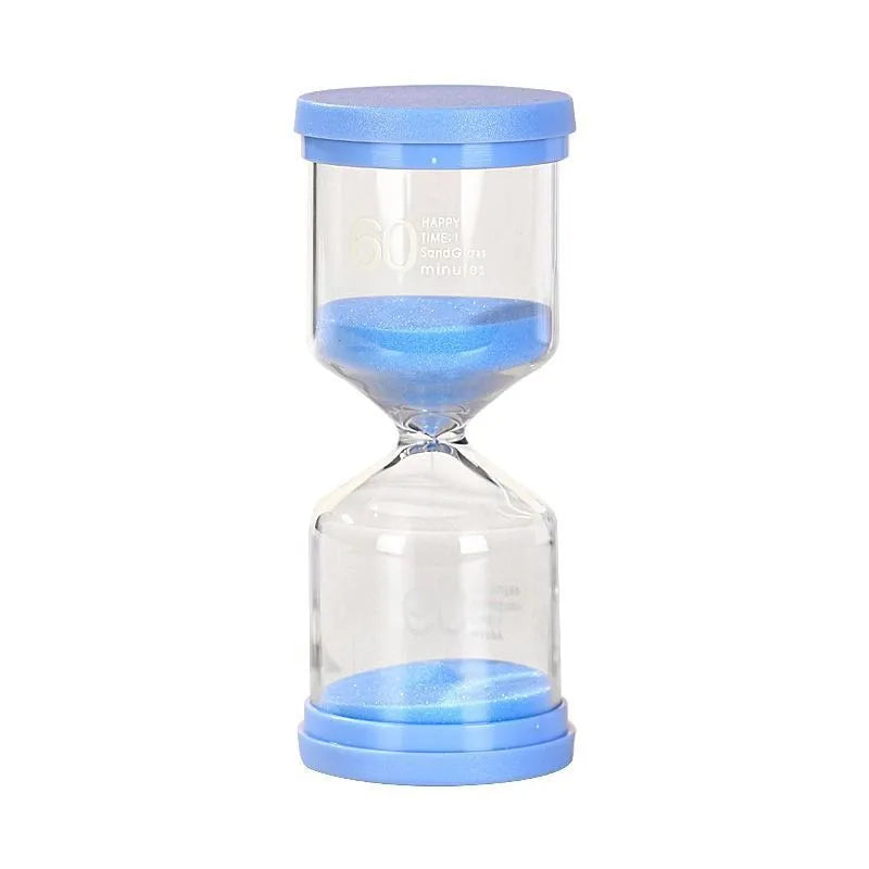 Handmade glass sand clock timer showing purple sand, set for a 5-minute duration on a wooden surface.