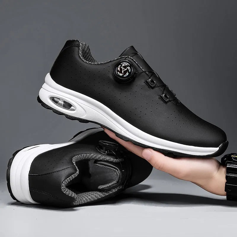 Black and white low top mesh tennis shoes with composite sole and cross shoulder straps