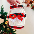 Red Christmas dog jumper on small dog showing crew neck design and festive colour