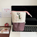 Cartoon pattern collapsible Oxford fabric pencil case in brown colour showing folded and unfolded states
