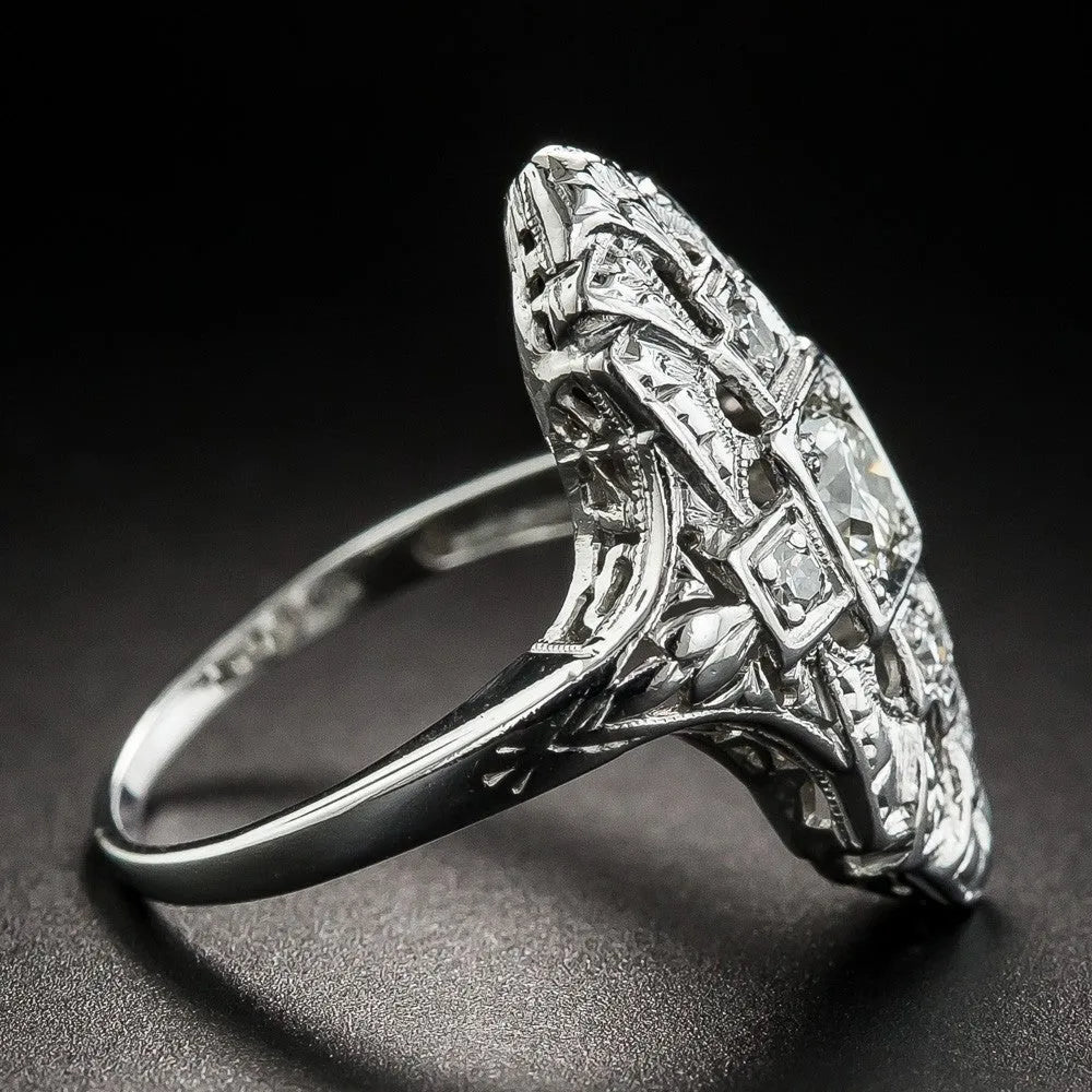 Geometric hollow-out copper ring with electroplated silver finish and diamond studs