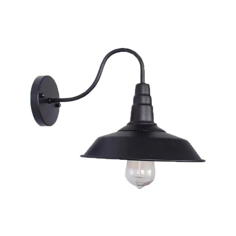 Retro style silver courtyard wall lamp mounted at right angle on villa exterior wall