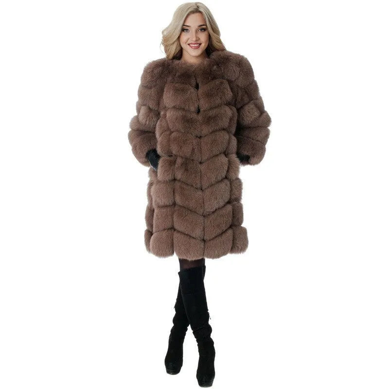 Women's long artificial fur coat in wine red colour, showing regular sleeves and knee-length fit.