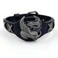 Geometric black leather bracelet with alloy eagle detailing showing tapered width design
