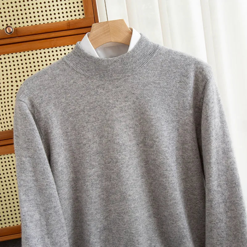 Man wearing a loose-fit half-collar wool sweater in a light business style for winter.