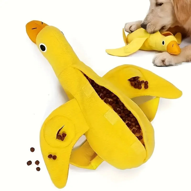 Yellow teddy dog training toy with integrated duck doll and food leak compartments