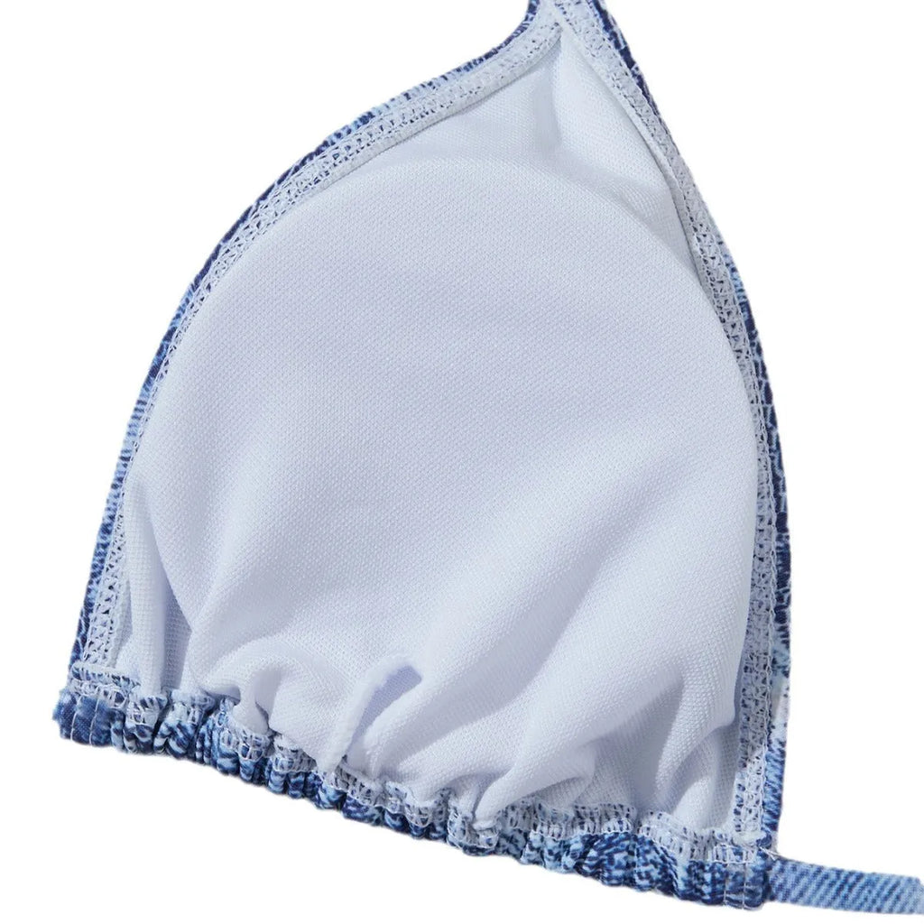 Women's denim blue strappy bikini set with printed design and two-piece swimwear construction