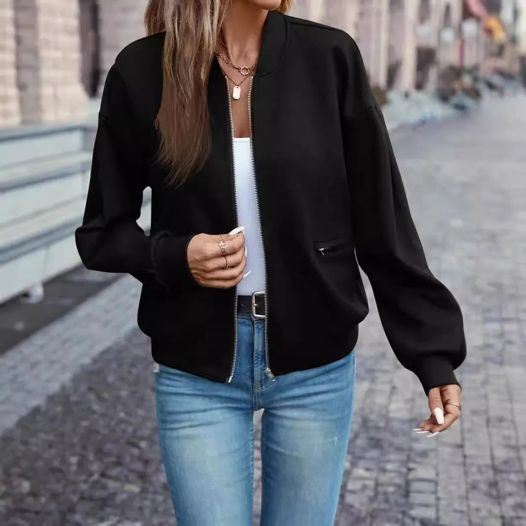 Black women's casual zip jacket with long sleeves and faux pocket detailing