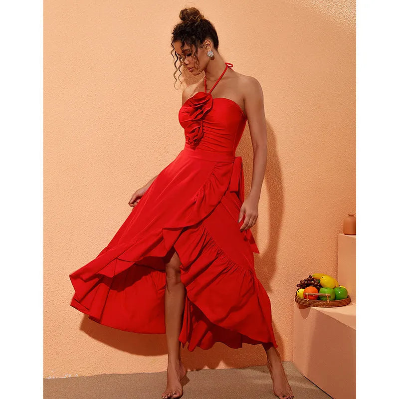Red women's one-piece V-neck swimsuit with open back and a matching detachable skirt.