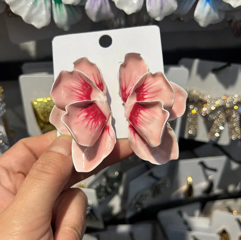 Pastoral style flower earrings with oil-spot glaze finish in blue, green, purple, and rose colours