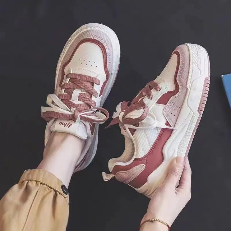 Beige and pink women's low-top rubber sneakers with a hidden height increase sole.