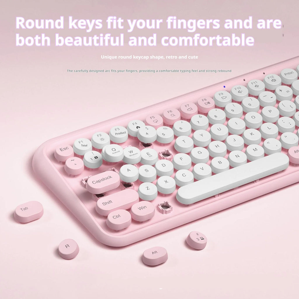 Pink wireless Bluetooth keyboard with 84 silent mechanical keys and compact design
