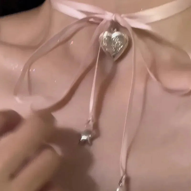 Women's ribbon love pendant fashion necklace in alloy with electroplated finish, clavicle chain length