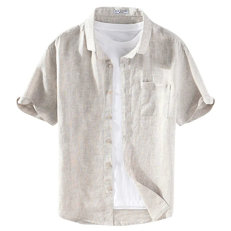 Men's raw jute and grey linen short sleeve shirt with square collar on hanger.