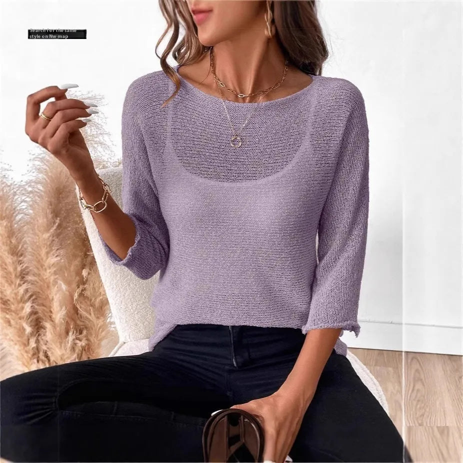 Woman wearing a thin knitted off-shoulder overall with a 3D pattern in a light colour.