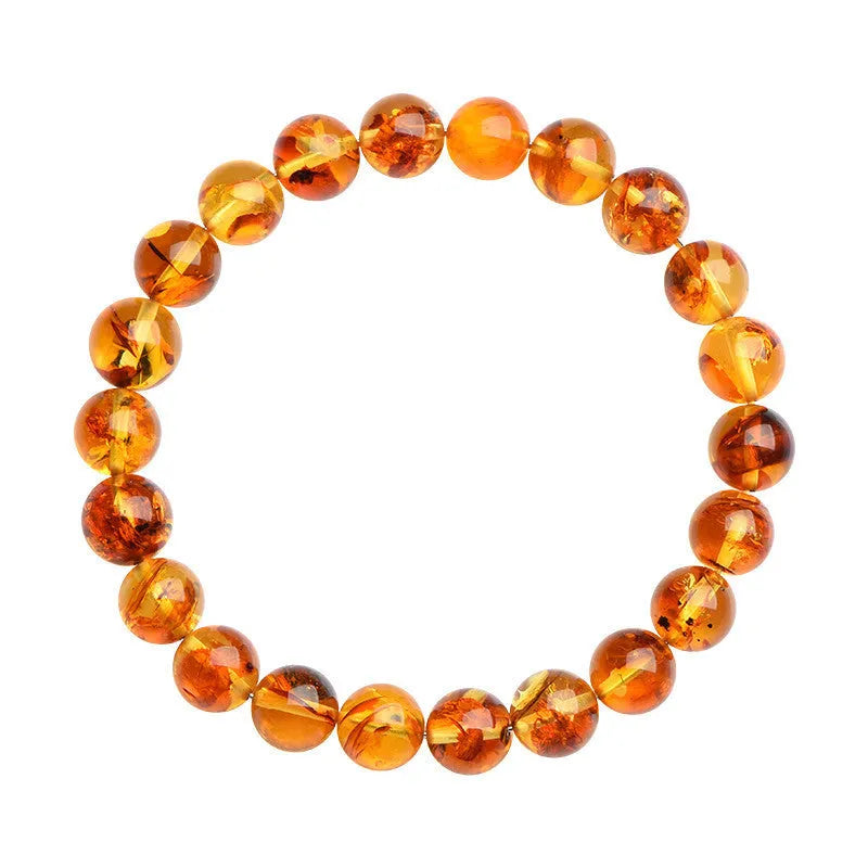 Natural yellow piebald amber bracelet with flower spot patterning in three bead size options