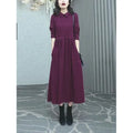 Purplish red women's plus size dress with extra long sleeves and long skirt for autumn winter wear
