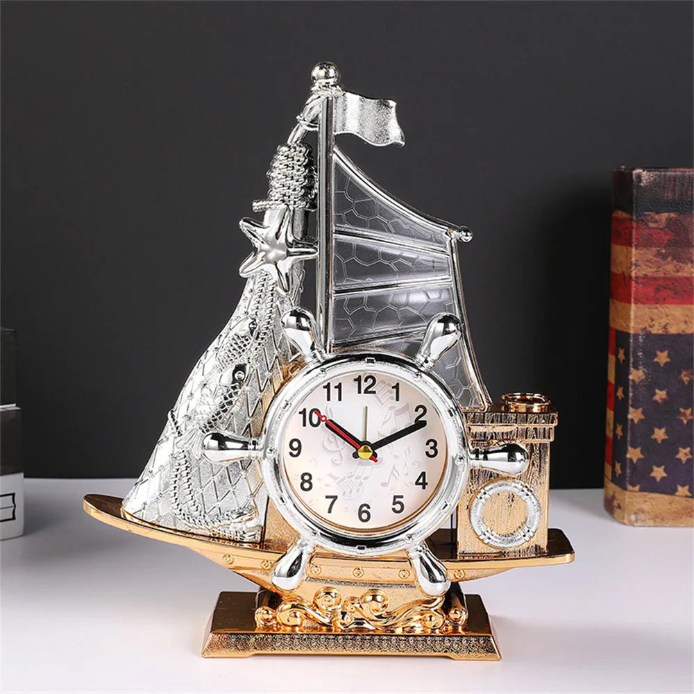 Fashion bedroom clock with gold or silver finish on plastic housing measuring 22.6cm wide