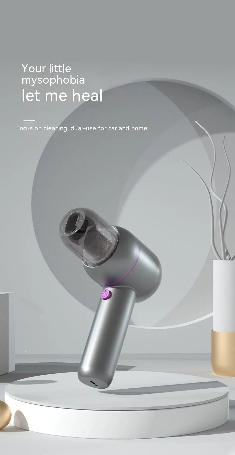 XC-06 grey handheld portable car vacuum cleaner and inflator with brush and extended nozzles.