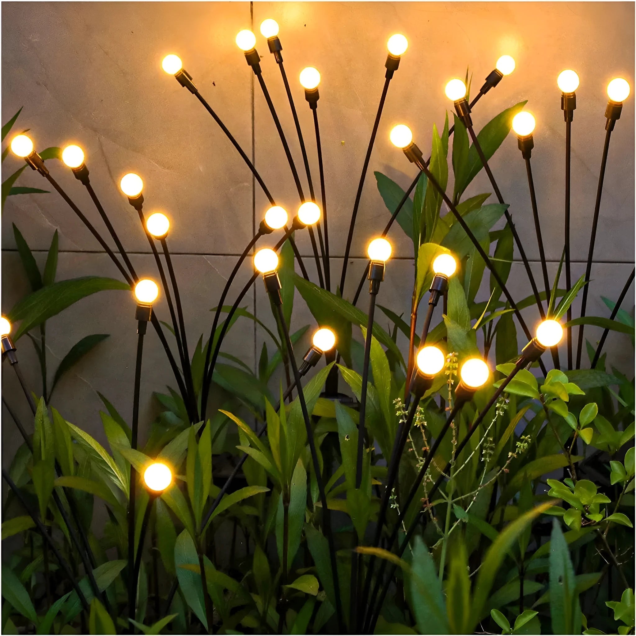 Solar-powered LED garden ground light with multiple LED heads and a stainless steel ground spike.