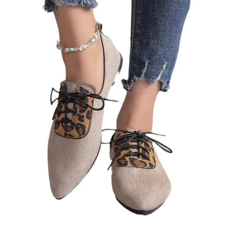 Beige leopard print pointed toe pumps for women in plus sizes, shown on a white background.