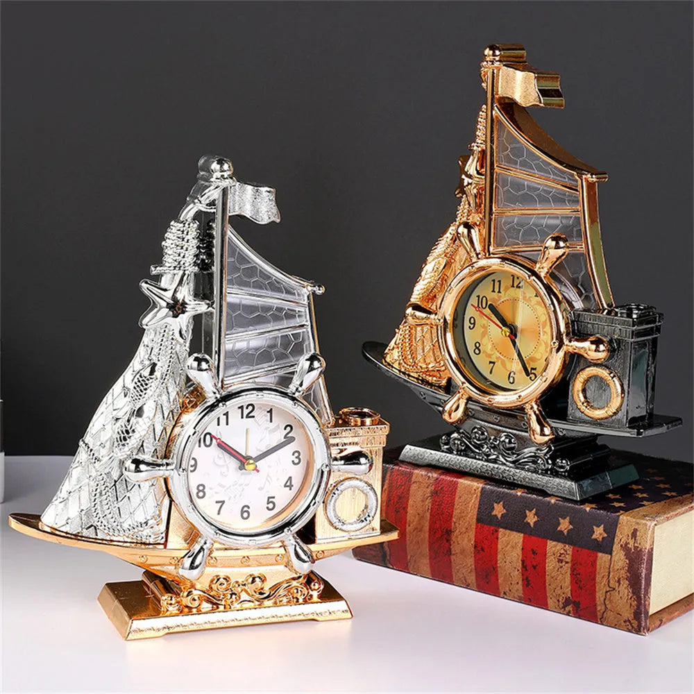 Fashion bedroom clock with gold or silver finish on plastic housing measuring 22.6cm wide