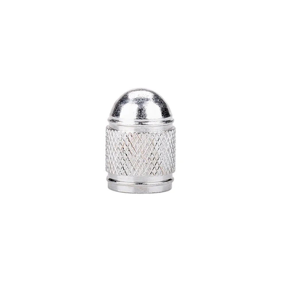 Aluminium mountain bike tyre valve cap in black, blue, gold, red, and silver colours.