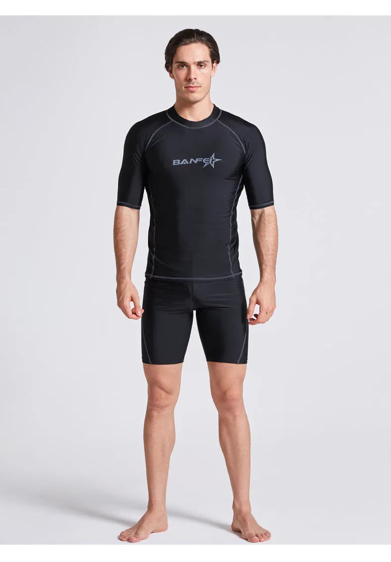 Men's blue quick-drying half sleeve nylon swimsuit set with swim top and pants for snorkelling