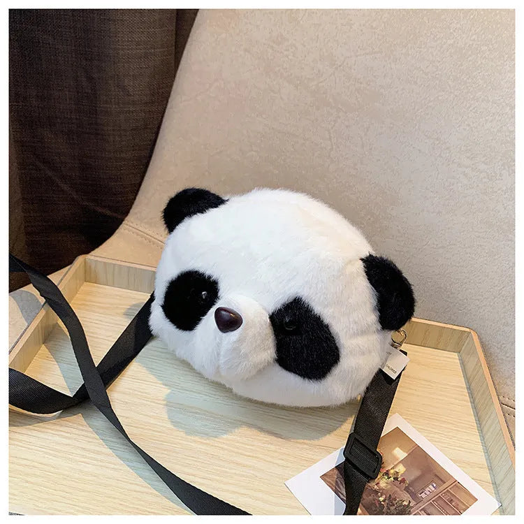 Plush cylindrical crossbody bag with panda head design measuring 18cm