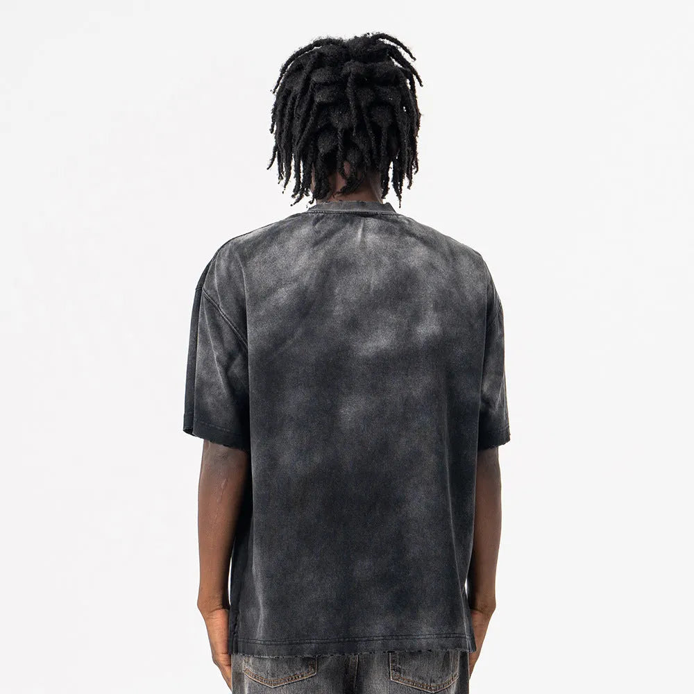 Black cotton men's t-shirt with printed letter design and loose fit short sleeves