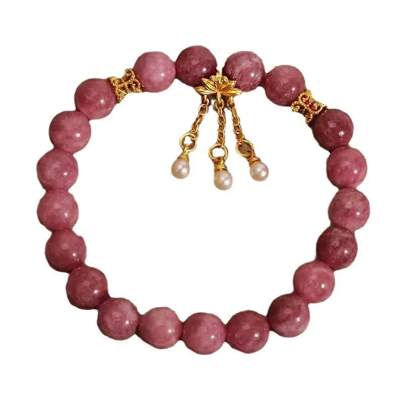 Pink lotus and pink white crystal natural stone bracelet with pearl pendant and lotus tassel in new Chinese style.