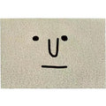 Square PVC floor mat with a cartoon facial expression geometric pattern in Mr. Big Nose colours.