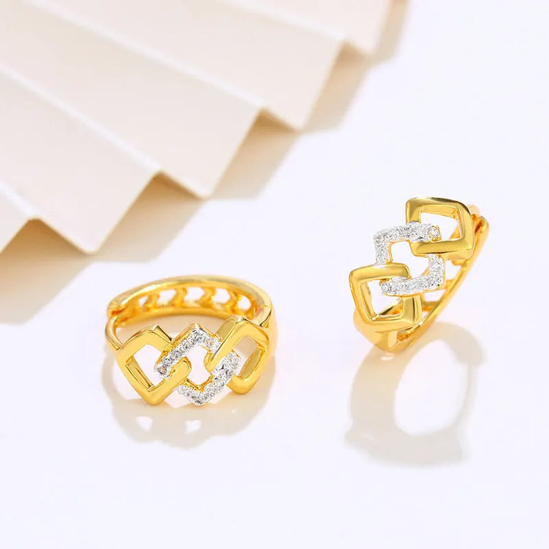 Geometric hollow-out gold earrings with electroplated finish and colour separation design