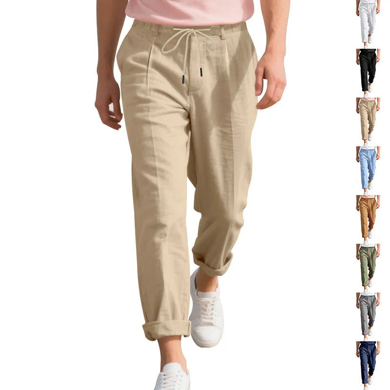 Men's light khaki linen casual trousers with a loose straight-leg fit and drawstring waist.