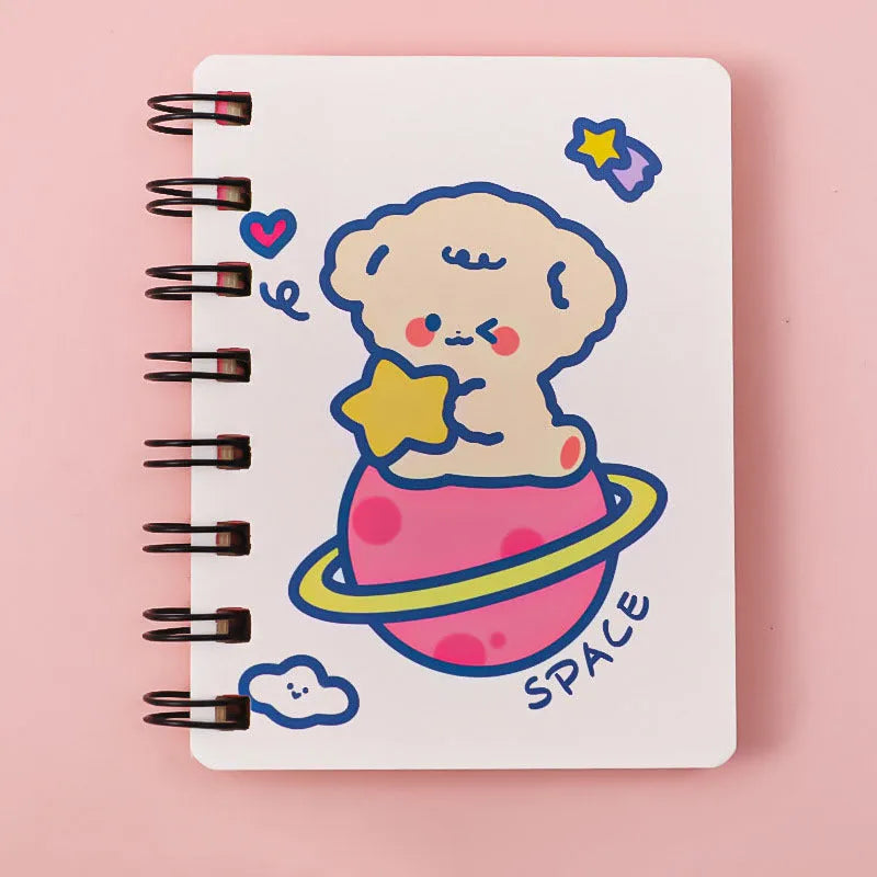 Small astronaut-themed flipper notebook showing one of four cover designs: Astronaut Bear, Planet Teddy, Space Cat, or UFO.