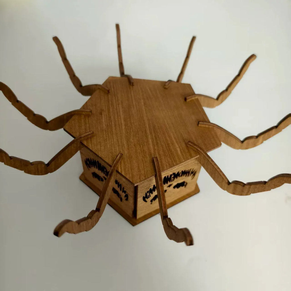 Wooden spider Halloween candlestick decoration measuring 21cm by 8.5cm