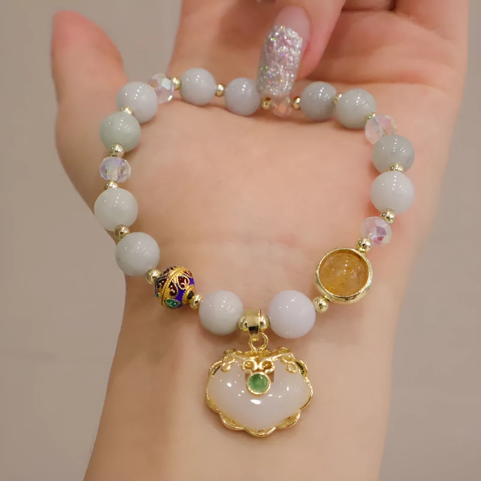 Geometric women's bracelet in genuine jade with metal ethnic decoration in grey jade colour