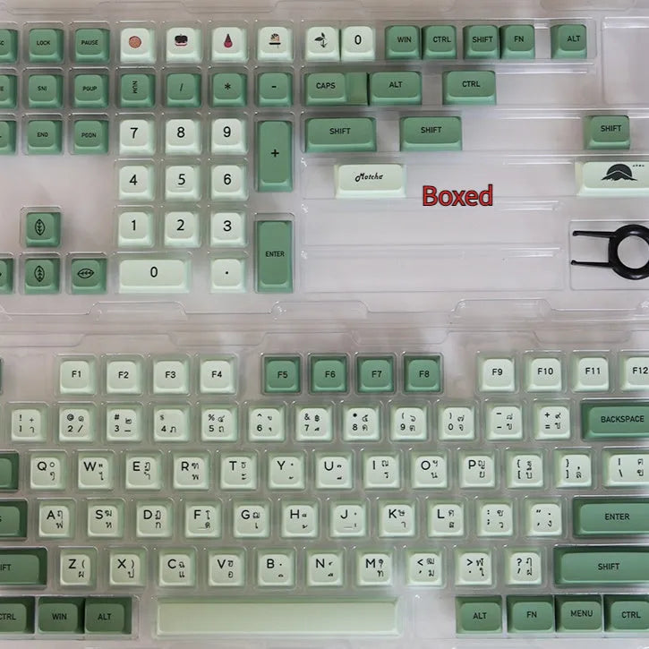 Full set of 124 matcha green PBT keycaps for a mechanical keyboard, showing various international layout options.