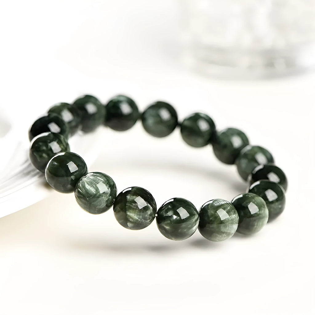 Green Dragon Crystal bracelet with 8-9mm round beads and Ruyi design on a single ring.