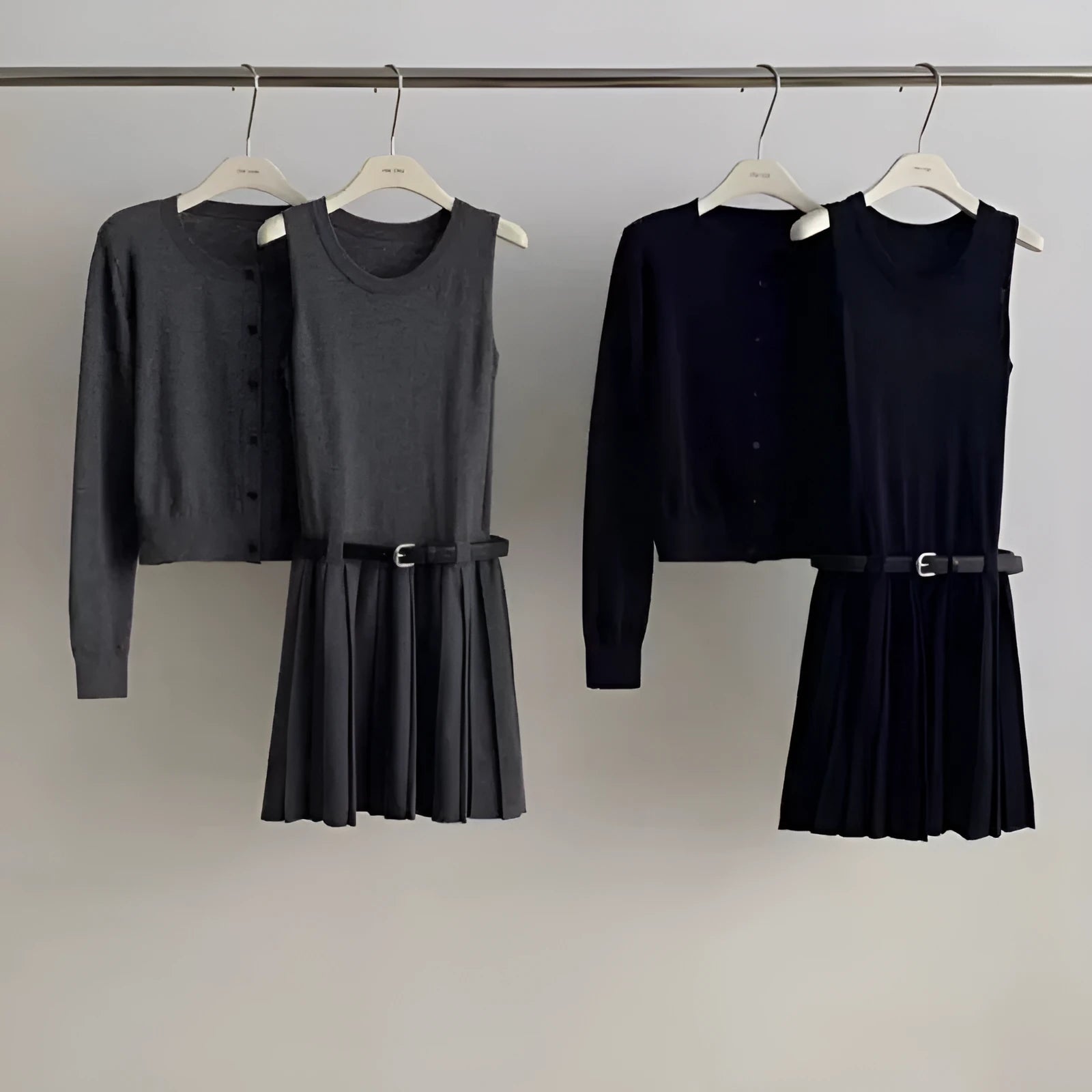 Women's black knitted two-piece set with pleated vest skirt and long-sleeve cardigan, national style art retro design