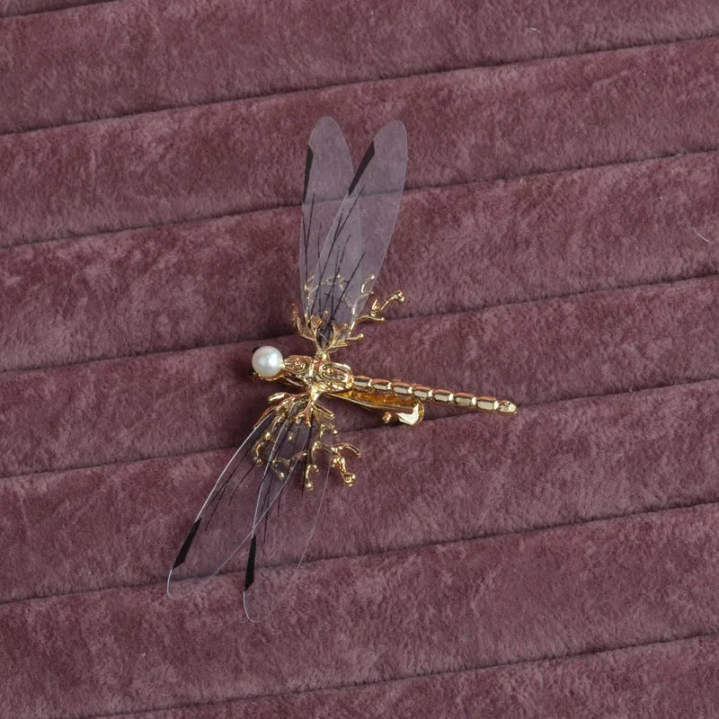 Golden dragonfly side clip headdress with electroplated alloy construction and jucai decoration