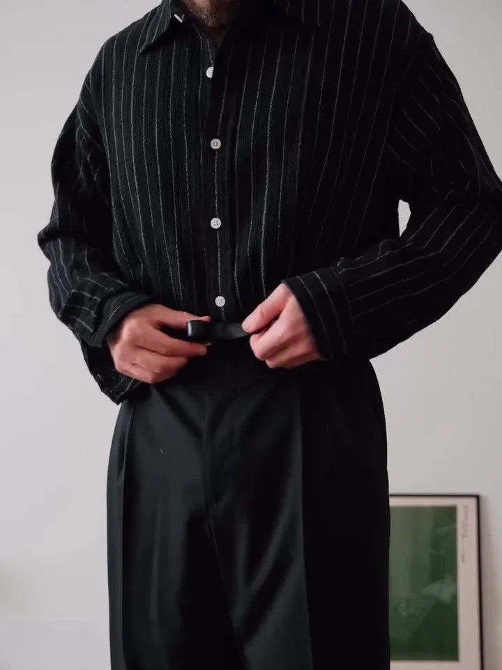Black pinstriped polyester button-down shirt with regular fit and long sleeves