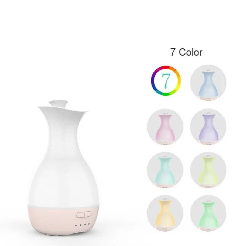 White or pink ultrasonic essential oil diffuser with 200ml tank, night light, and control buttons.