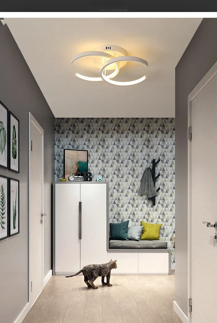 Three styles of commercial LED corridor lights: black double semicircle, white double circle, and white bipartite designs